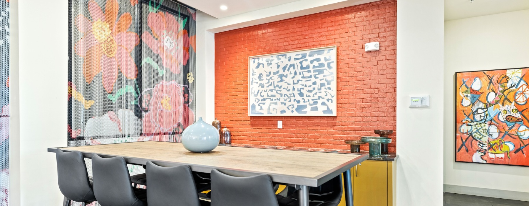 a spacious room with a large table